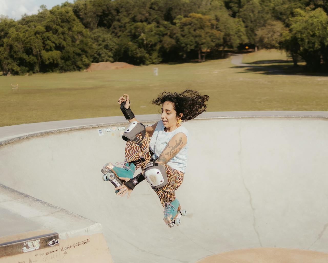 Crafting Captivating Headlines: Your awesome post title goes here Energetic woman roller skating in a skate park bowl, showcasing vibrant motion and excitement.