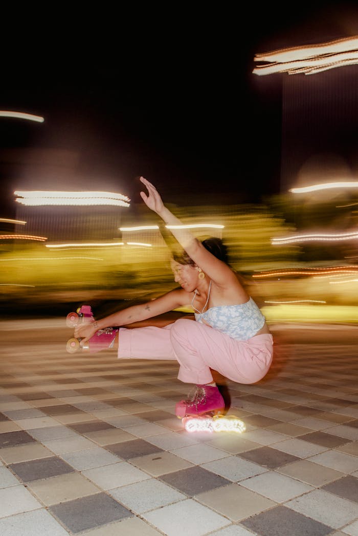 Mastering the First Impression: Your intriguing post title goes here A person performing tricks on roller skates at night, captured with motion blur.